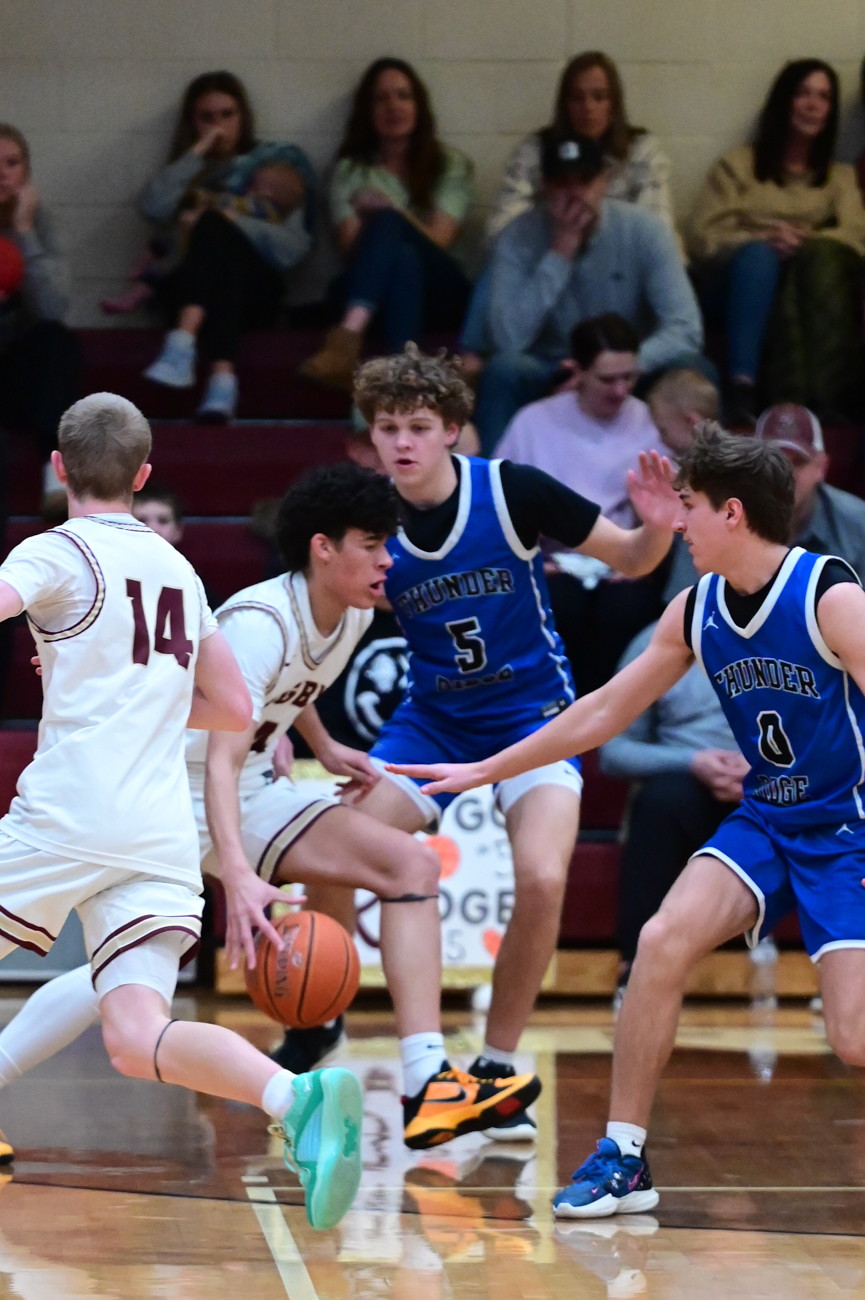 Royce Castle handling the ball against pressure defense