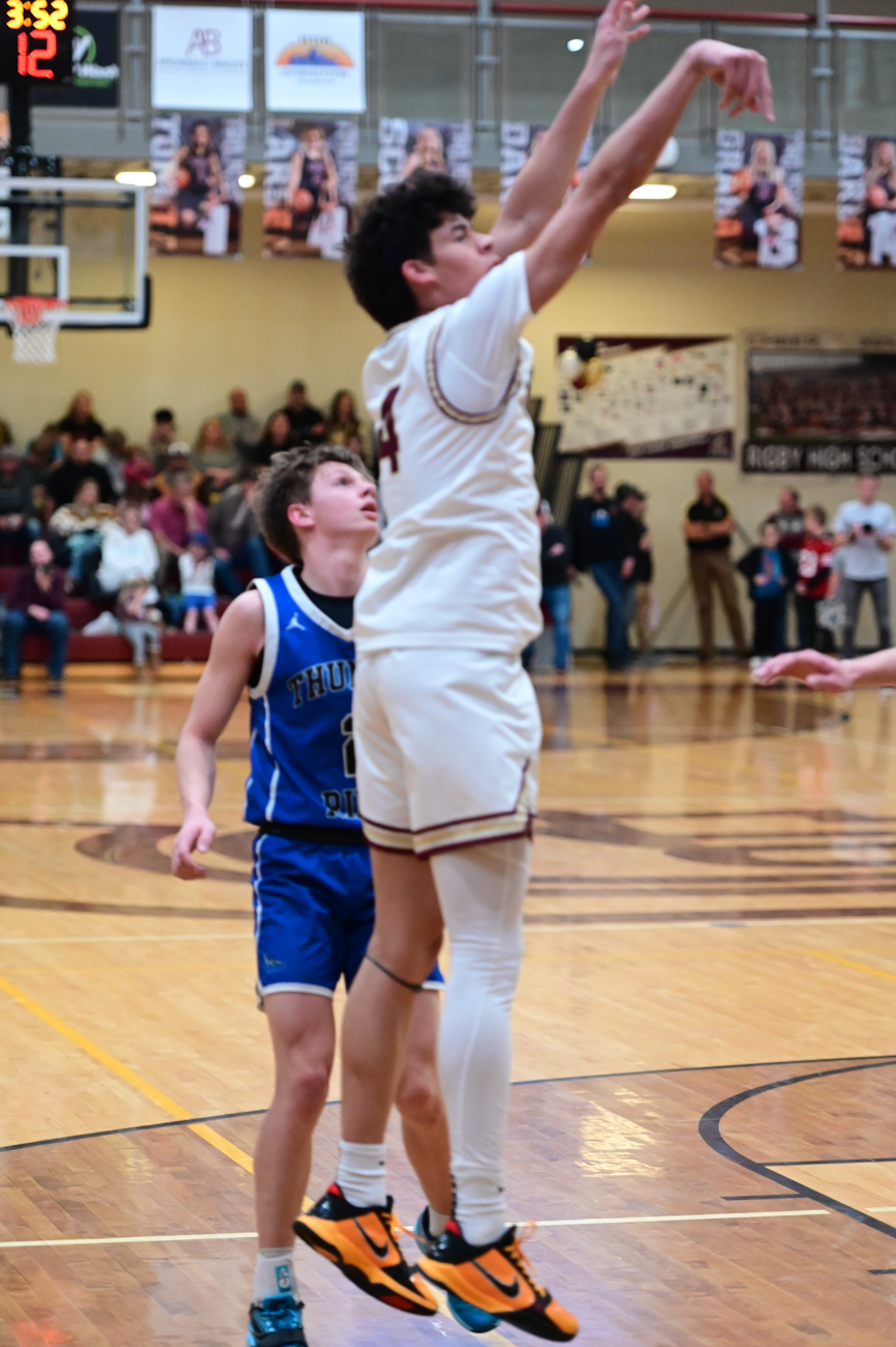 Royce Castle rising into a jump shot